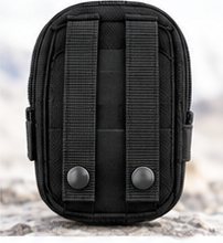 Rear of an accessory showing two vertical webbing straps with snaps